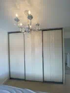 3 door sliding wardrobe with Sahara design in mussel with gun metal frames, fitted in Ingleby Barwick